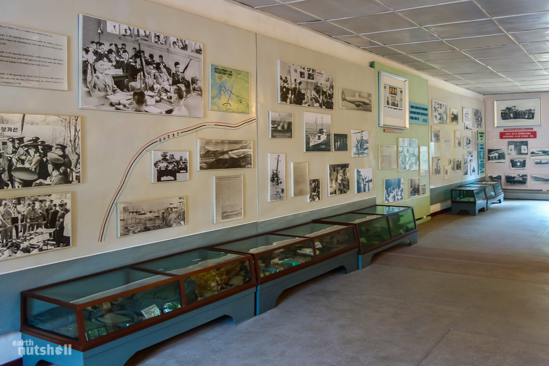 Just one wall of propaganda photos within the North Korea Peace Museum at Panmunjom